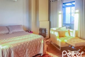 Casa em Condomínio à venda com 166m², 3 dormitórios, 2 suítes, 1 vaga, no bairro Hípica em Porto Alegre