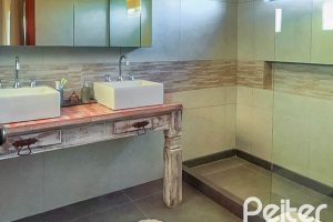 Casa em Condomínio à venda com 166m², 3 dormitórios, 2 suítes, 1 vaga, no bairro Hípica em Porto Alegre