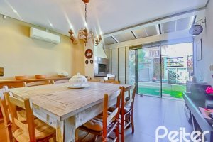 Casa em Condomínio à venda com 166m², 3 dormitórios, 2 suítes, 1 vaga, no bairro Hípica em Porto Alegre