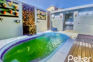 Casa em Condomínio à venda com 166m², 3 dormitórios, 2 suítes, 1 vaga, no bairro Hípica em Porto Alegre