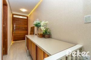 Casa em Condomínio à venda com 206m², 3 dormitórios, 2 suítes, 4 vagas, no bairro Vila Nova em PORTO ALEGRE