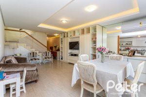 Casa em Condomínio à venda com 206m², 3 dormitórios, 2 suítes, 4 vagas, no bairro Vila Nova em PORTO ALEGRE