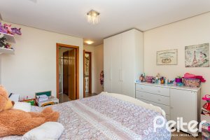 Casa em Condomínio à venda com 206m², 3 dormitórios, 2 suítes, 4 vagas, no bairro Vila Nova em PORTO ALEGRE