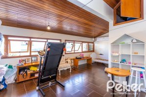 Casa em Condomínio à venda com 206m², 3 dormitórios, 2 suítes, 4 vagas, no bairro Vila Nova em PORTO ALEGRE