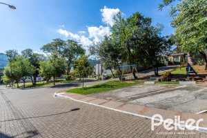 Casa em Condomínio à venda com 206m², 3 dormitórios, 2 suítes, 4 vagas, no bairro Vila Nova em PORTO ALEGRE