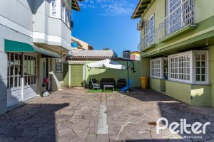 Casa em Condomínio à venda com 181m², 3 dormitórios, 1 suíte, 2 vagas, no bairro Ipanema em Porto Alegre