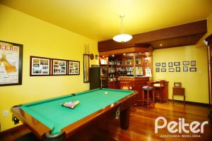 Casa à venda com 362m², 4 dormitórios, 1 suíte, 2 vagas, no bairro Nonoai em Porto Alegre