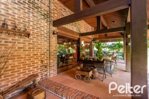 Casa em Condomínio à venda com 789m², 5 dormitórios, 3 suítes, 5 vagas, no bairro Cavalhada em PORTO ALEGRE