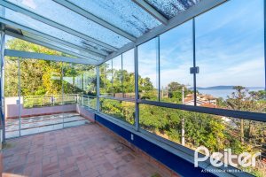 Casa à venda com 354m², 2 dormitórios, 2 suítes, 3 vagas, no bairro Sétimo Céu em Porto Alegre