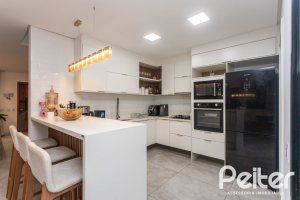 Casa em Condomínio à venda com 183m², 3 dormitórios, 3 suítes, 2 vagas, no bairro Ipanema em Porto Alegre