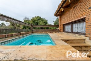 Casa em Condomínio à venda com 331m², 4 dormitórios, 4 suítes, 3 vagas, no bairro Tristeza em Porto Alegre