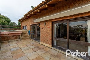 Casa em Condomínio à venda com 331m², 4 dormitórios, 4 suítes, 3 vagas, no bairro Tristeza em Porto Alegre