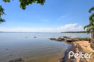 Casa em Condomínio à venda com 331m², 4 dormitórios, 4 suítes, 3 vagas, no bairro Tristeza em Porto Alegre