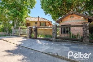 Casa em Condomínio à venda com 331m², 4 dormitórios, 4 suítes, 3 vagas, no bairro Tristeza em Porto Alegre