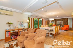 Casa em Condomínio à venda com 420m², 5 dormitórios, 2 suítes, 2 vagas, no bairro Cavalhada em PORTO ALEGRE