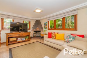 Casa em Condomínio à venda com 420m², 5 dormitórios, 2 suítes, 2 vagas, no bairro Cavalhada em PORTO ALEGRE