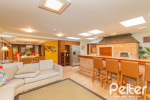 Casa em Condomínio à venda com 420m², 5 dormitórios, 2 suítes, 2 vagas, no bairro Cavalhada em PORTO ALEGRE