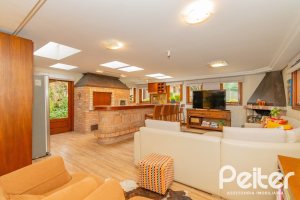 Casa em Condomínio à venda com 420m², 5 dormitórios, 2 suítes, 2 vagas, no bairro Cavalhada em PORTO ALEGRE