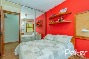 Casa em Condomínio à venda com 420m², 5 dormitórios, 2 suítes, 2 vagas, no bairro Cavalhada em PORTO ALEGRE