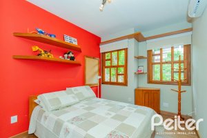 Casa em Condomínio à venda com 420m², 5 dormitórios, 2 suítes, 2 vagas, no bairro Cavalhada em PORTO ALEGRE