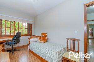 Casa em Condomínio à venda com 420m², 5 dormitórios, 2 suítes, 2 vagas, no bairro Cavalhada em PORTO ALEGRE