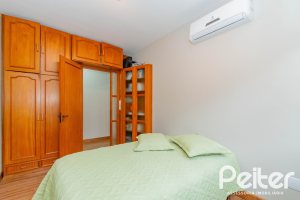 Casa em Condomínio à venda com 420m², 5 dormitórios, 2 suítes, 2 vagas, no bairro Cavalhada em PORTO ALEGRE