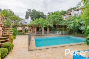 Casa em Condomínio à venda com 420m², 5 dormitórios, 2 suítes, 2 vagas, no bairro Cavalhada em PORTO ALEGRE