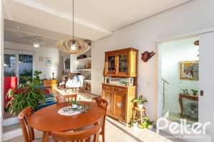 Casa em Condomínio à venda com 161m², 2 dormitórios, 2 suítes, 2 vagas, no bairro Vila Nova em PORTO ALEGRE