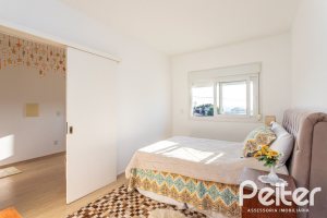 Casa em Condomínio à venda com 161m², 2 dormitórios, 2 suítes, 2 vagas, no bairro Vila Nova em PORTO ALEGRE