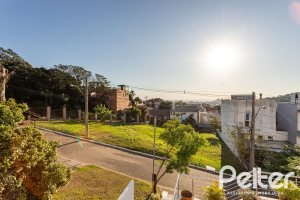 Casa em Condomínio à venda com 161m², 2 dormitórios, 2 suítes, 2 vagas, no bairro Vila Nova em PORTO ALEGRE