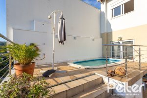 Casa em Condomínio à venda com 161m², 2 dormitórios, 2 suítes, 2 vagas, no bairro Vila Nova em PORTO ALEGRE