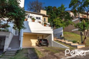 Casa em Condomínio à venda com 161m², 2 dormitórios, 2 suítes, 2 vagas, no bairro Vila Nova em PORTO ALEGRE