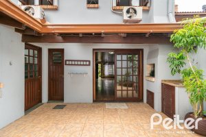 Casa à venda com 174m², 3 dormitórios, 1 suíte, 2 vagas, no bairro Jardim Isabel em Porto Alegre