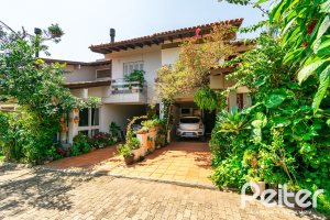 Casa em Condomínio à venda com 245m², 3 dormitórios, 1 suíte, 2 vagas, no bairro Tristeza em PORTO ALEGRE