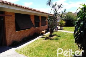 Casa à venda com 400m², 7 dormitórios, 1 suíte, 5 vagas, no bairro Vila Assunção em Porto Alegre