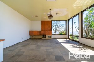 Casa à venda com 528m², 5 dormitórios, 3 suítes, 5 vagas, no bairro Vila Assunção em Porto Alegre