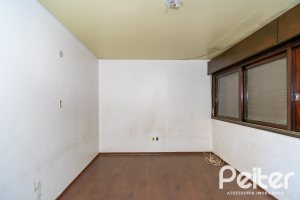 Casa à venda com 528m², 5 dormitórios, 3 suítes, 5 vagas, no bairro Vila Assunção em Porto Alegre