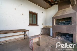 Casa à venda com 528m², 5 dormitórios, 3 suítes, 5 vagas, no bairro Vila Assunção em Porto Alegre