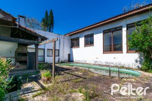 Casa à venda com 528m², 5 dormitórios, 3 suítes, 5 vagas, no bairro Vila Assunção em Porto Alegre