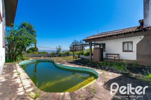 Casa à venda com 528m², 5 dormitórios, 3 suítes, 5 vagas, no bairro Vila Assunção em Porto Alegre