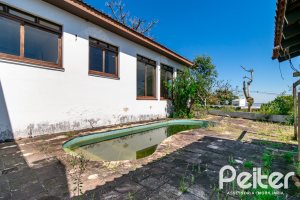 Casa à venda com 528m², 5 dormitórios, 3 suítes, 5 vagas, no bairro Vila Assunção em Porto Alegre