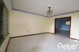 Casa à venda com 510m², 4 dormitórios, 4 vagas, no bairro Vila Nova em Porto Alegre