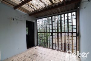 Casa à venda com 510m², 4 dormitórios, 4 vagas, no bairro Vila Nova em Porto Alegre