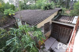 Casa à venda com 510m², 4 dormitórios, 4 vagas, no bairro Vila Nova em Porto Alegre