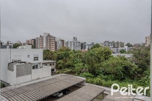 Apartamento à venda com 76m², 2 dormitórios, 1 suíte, 2 vagas, no bairro Tristeza em Porto Alegre