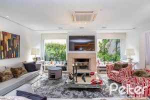 Casa em Condomínio à venda com 457m², 4 dormitórios, 4 suítes, 6 vagas, no bairro Pedra Redonda em PORTO ALEGRE