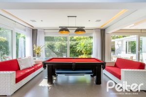 Casa em Condomínio à venda com 457m², 4 dormitórios, 4 suítes, 6 vagas, no bairro Pedra Redonda em PORTO ALEGRE