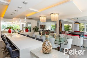 Casa em Condomínio à venda com 457m², 4 dormitórios, 4 suítes, 6 vagas, no bairro Pedra Redonda em PORTO ALEGRE