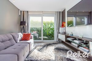 Casa em Condomínio à venda com 457m², 4 dormitórios, 4 suítes, 6 vagas, no bairro Pedra Redonda em PORTO ALEGRE