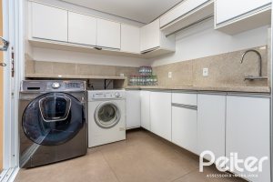 Casa em Condomínio à venda com 457m², 4 dormitórios, 4 suítes, 6 vagas, no bairro Pedra Redonda em PORTO ALEGRE